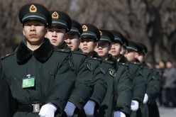 Huang posits that the parade is a warning to Washington not to interfere with regional disputes.