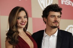 Actor Orlando Bloom (R) and model Miranda Kerr pose at the InStyle/Warner Bros. after party following the 70th annual Golden Globe Awards in Beverly Hills, California January 13, 2013. 