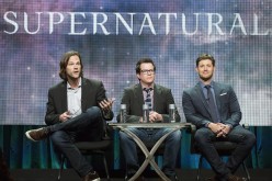 Cast member Jared Padalecki (L) speaks next to writer Jeremy Carver (C) and co-star Jensen Ackles at a panel for The CW television series 