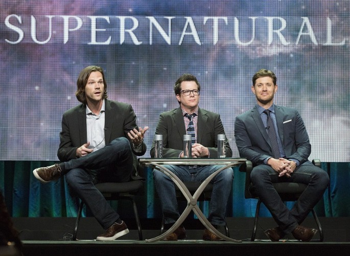 Cast member Jared Padalecki (L) speaks next to writer Jeremy Carver (C) and co-star Jensen Ackles at a panel for The CW television series "Supernatural" during the Television Critics Association Cable