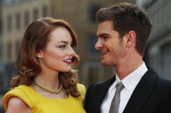 Actors Emma Stone and Andrew Garfield pose for photographs at the world premiere of The Amazing Spiderman 2 in central London, April 10, 2014.  