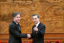 Foreign Minister Wang Yi with U.S. Deputy Secretary of State Tony Blinken at the Olive Hall before a meeting at the Foreign Ministry office in Beijing in Feb. 2015.