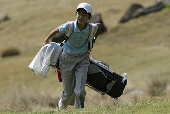 A young golfer during a junior tournament at the Clearwater Bay Golf and Country Club in Hong Kong in 2007. 