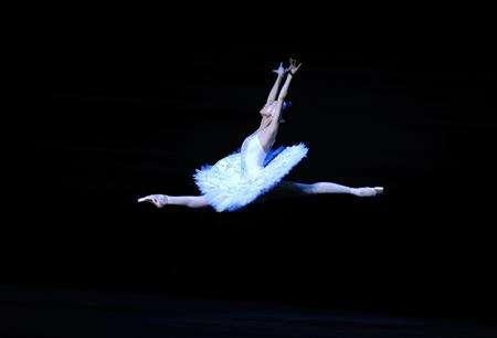 A ballerina from The National Ballet of China dances Tchaikovsky's "Swan Lake."