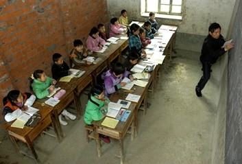 Students attend class at a village on the outskirts of Baokang, in central China's Hubei Province.