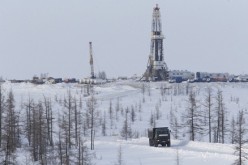 A view of an oil derrick at the Rosneft company-owned Suzunskoye oil field, north from the Russian Siberian city of Krasnoyarsk.