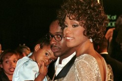 File Photo Showing Bobbi Kristina Brown, Bobby Brown, Whitney Houston In Happier Days