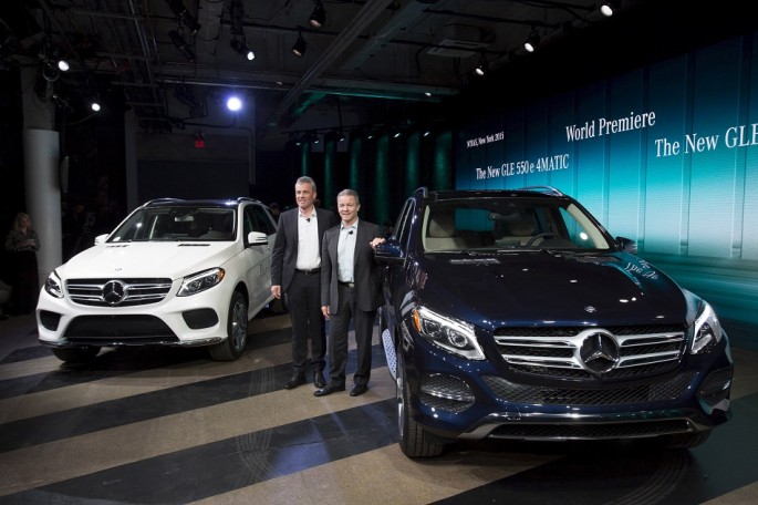 Mercedes-Benz USA officials Wolf-Dieter Kurz (L) and Stephen Cannon present the new Mercedes-Benz GLE 550 e 4MATIC and the new GLE 35 4MATIC at the 2015 New York International Auto Show in New York.
