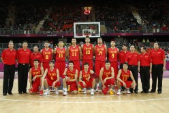 Members of China's national basketball team pose for a picture at the London 2012 Olympic Games in the Basketball arena, July 29, 2012. 