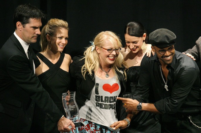 Cast members Thomas Gibson, A.J. Cook, Kirsten Vangsness, Paget Brewster and Shemar Moore pose after accepting the Favorite Drama Ensemble award for "Criminal Minds" during the 14th Annual Diversity A