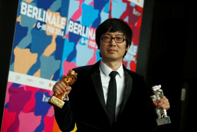 Diao Yinan, director of "Black Coal, Thin Ice," poses during a news conference after the awards ceremony of the 64th Berlinale International Film Festival in 2014.