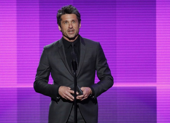 Actor Patrick Dempsey presents the award for favorite pop/rock band duo or group during the 42nd American Music Awards in Los Angeles, California November 23, 2014