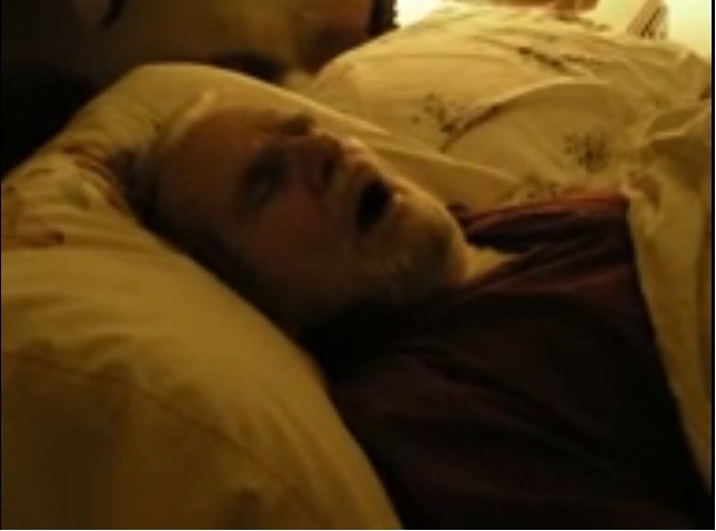 A man snoring while sleeping