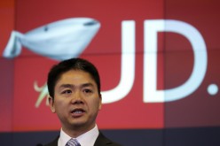 JD.com founder and CEO Richard Liu speaks at the NASDAQ building at Times Square, New York.