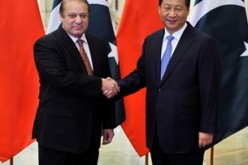 Pakistan's Prime Minister Nawaz Sharif shakes hands with President Xi Jinping before a meeting at the Great Hall of the People in Beijing, Nov. 8, 2014.
