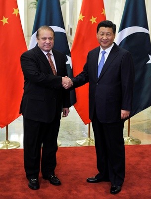 Pakistan's Prime Minister Nawaz Sharif shakes hands with President Xi Jinping before a meeting at the Great Hall of the People in Beijing, Nov. 8, 2014.