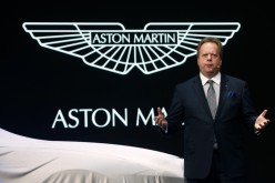 Aston Martin CEO Andrew Palmer addresses the media during the 85th International Motor Show in Geneva, March 3, 2015. 