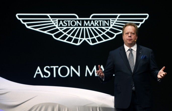 Aston Martin CEO Andrew Palmer addresses the media during the 85th International Motor Show in Geneva, March 3, 2015. 