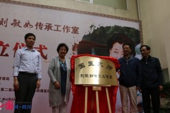 Chinese traditional medicine guru Liu Minru (2nd L) opens her third clinic in Sichuan Province.