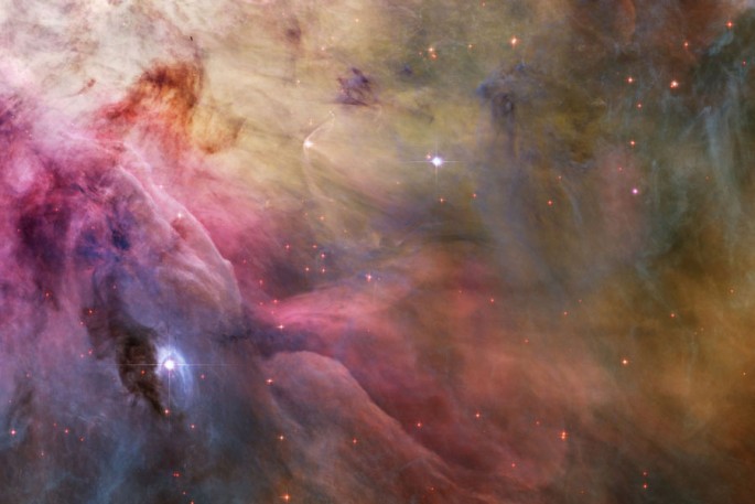 This esthetic close-up of cosmic clouds and stellar winds features LL Orionis, interacting with the Orion Nebula flow.