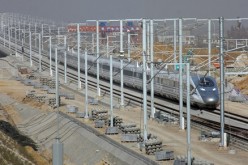 A high speed train travels during a test operation in Bengbu, Anhui Province in Dec. 2010. The train CRH380A hit a speed of 486km/hr and broke the world record for unmodified commercial use.
