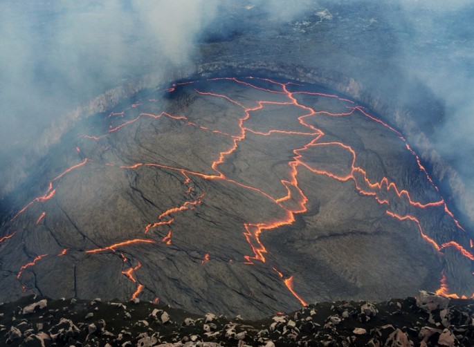 The level of the lava lake within the Overlook crater, set within Halemaʻumaʻu Crater at the summit of Kīlauea Volcano, continues to rise. 
