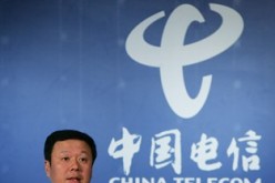 Chairman and chief executive of China Telecom Corp. Ltd. Wang Xiaochu speaks during a news conference in Hong Kong.