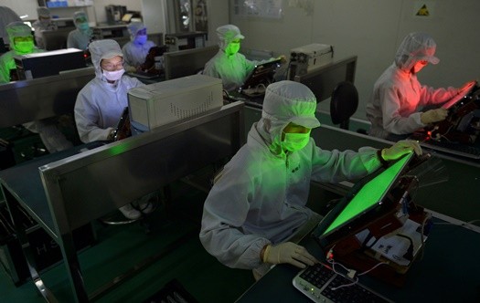 Employees work inside an LCD factory in Wuhan, Hubei Province.