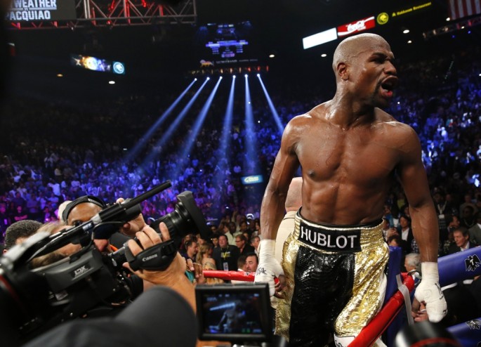 Floyd Mayweather, Jr. of the U.S.  yells out to the crowd after defeating Manny Pacquiao of the Philippines in their welterweight WBO, WBC and WBA (Super) title fight in Las Vegas, Nevada, May 2, 2015. 