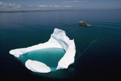 ship towing an iceberg