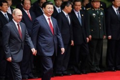 President Xi meets Putin in Shanghai during a two-day visit to China last year, where he was expected to sign a deal on gas supply and infrastructure projects with the Chinese government. 