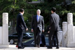 Apple CEO Tim Cook arrives in Beijing to meet with Chinese Vice Premier Liu Yandong on May 12, 2015. Cook is in China to discuss forest conservation as well as to promote the Apple Pay service. 