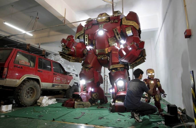 A man works on a replica of the Iron Man armor and "Hulkbuster" armor from the movie "Avengers: Age of Ultron" in Zhengzhou, Henan Province. 