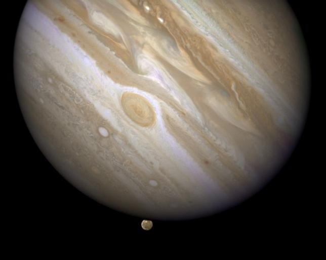 The planet Jupiter is shown with one of its moons, Ganymede (bottom) taken April 9, 2007.