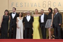 Margaret Sixel (L), Nicholas Hoult, Zoe Kravitz, George Miller, Charlize Theron, Tom Hardy, Courtney Eaton and Doug Mitchell pose as they arrive for the screening of 
