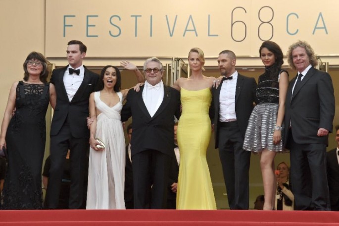 Margaret Sixel (L), Nicholas Hoult, Zoe Kravitz, George Miller, Charlize Theron, Tom Hardy, Courtney Eaton and Doug Mitchell pose as they arrive for the screening of "Mad Max: Fury Road" during the 68th Cannes Film Festival in Cannes, on May 14, 2015.