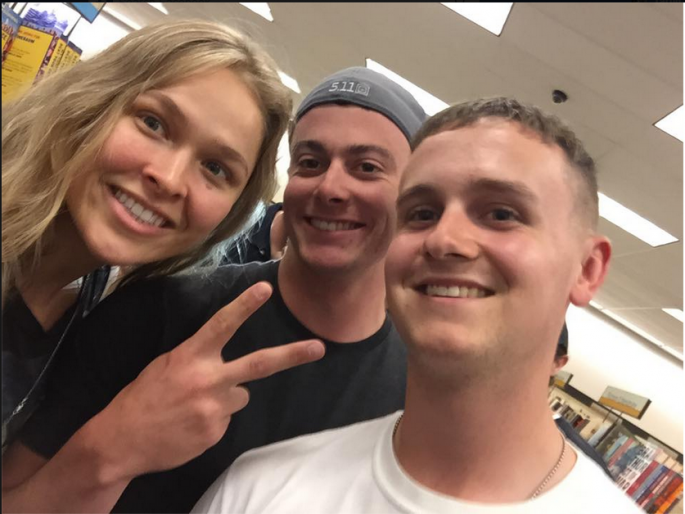 UFC Bantamweight Champion Ronda Rousey Poses With Fans For Selfie During Her Book Signing Event