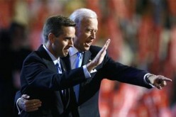 Attorney General Beau Biden and Vice Presidential candidate Senator Joe Biden (D-DE) gesture on stage at the 2008 Democratic National Convention in Denver, Colorado August 27, 2008.