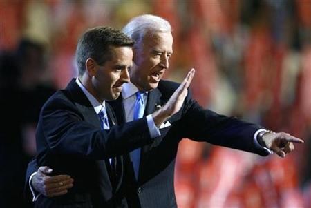Attorney General Beau Biden and Vice Presidential candidate Senator Joe Biden (D-DE) gesture on stage at the 2008 Democratic National Convention in Denver, Colorado August 27, 2008.