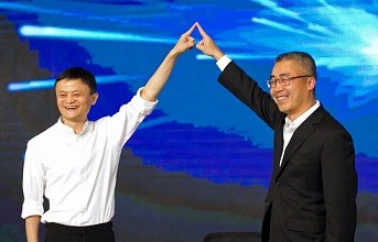 Alibaba's Executive Chairman Jack Ma and Shanghai Media Group (SMG) Chairman Li Ruigang at a news conference in Shanghai.