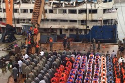 A mourning ceremony is held on June 7, 2015, for nearly 400 deceased of a capsized cruise ship on the Yangtze River in central China's Hubei Province. 