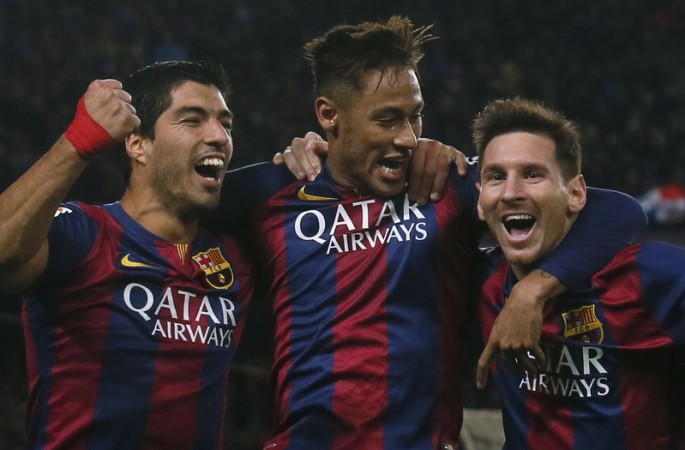 From L to R: Luis Suarez, Neymar, and Lionel Messi celebrates for Barcelona.