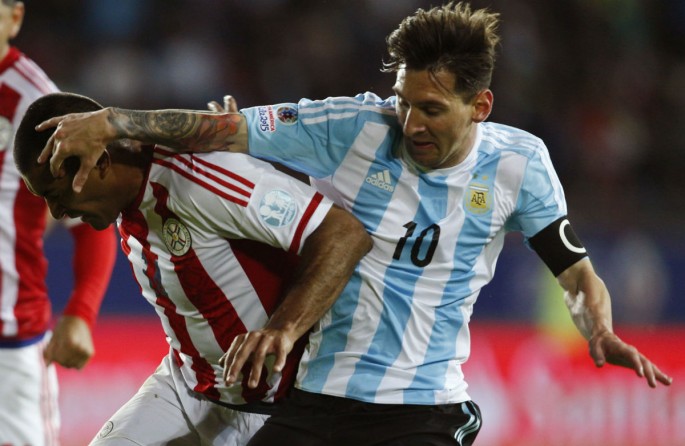Argentina's Lionel Messi got entangled with Paraguay's Paulo Da Silva during their Copa America 2015 opener.