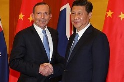 President Xi Jinping and Australian Prime Minister Tony Abbott meet during the G20 meeting in Brisbane last year. 