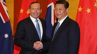President Xi Jinping and Australian Prime Minister Tony Abbott meet during the G20 meeting in Brisbane last year. 