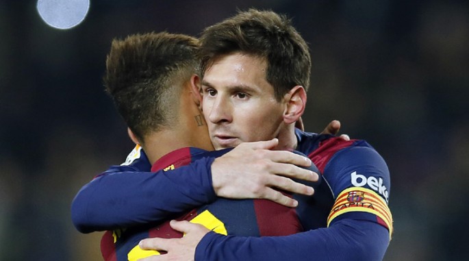 Argentina's Lionel Messi (R) embraces Barça teammate Neymar of Brazil.