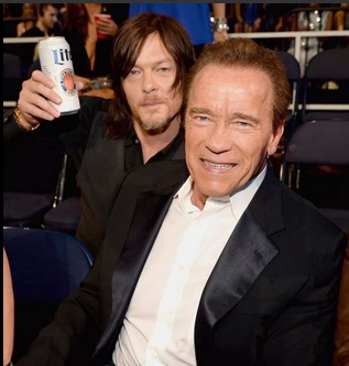 "The Walking Dead" actor Norman Reedus poses with "Terminator Genisys" star Arnold Schwarzenegger.