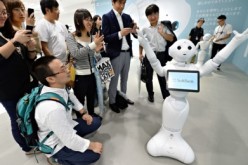 The new conglomerate comprised of Alibaba, Foxconn and Japan's SoftBank will start selling human-like robots on June 20, Saturday.