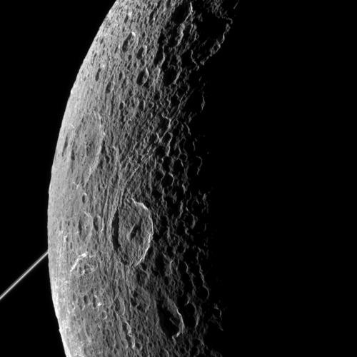 Cassini's view of Saturn' cratered moon Dione taken last Tuesday, June 16.