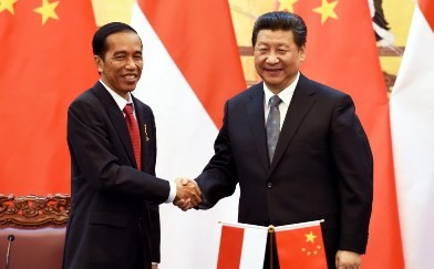 Indonesian President Joko Widodo meets with President Xi Jinping at Beijing in March, inviting Chinese firms to support infrastructure projects in Indonesia. 